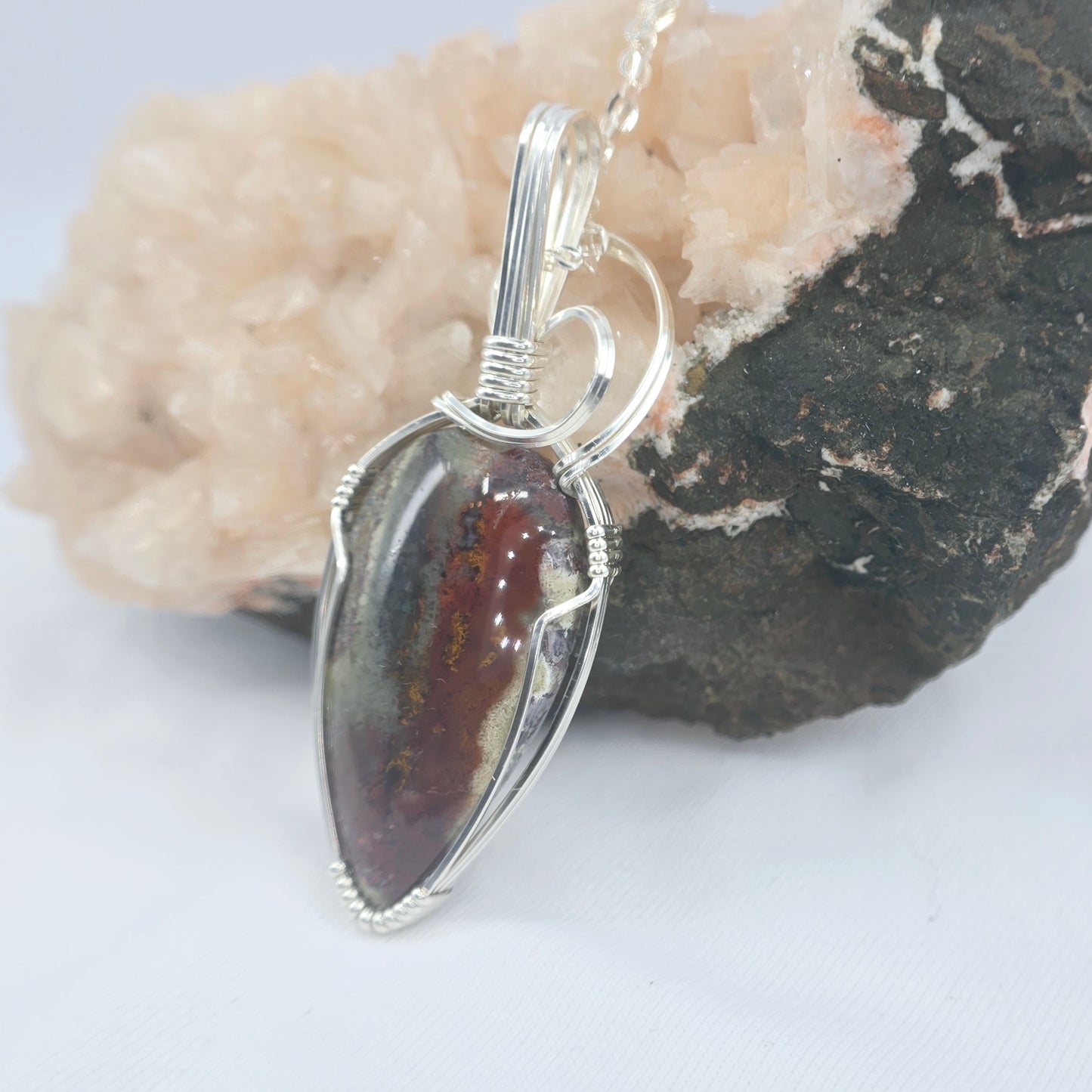 Dragon's Blood Pendant Wrapped In Sterling Silver