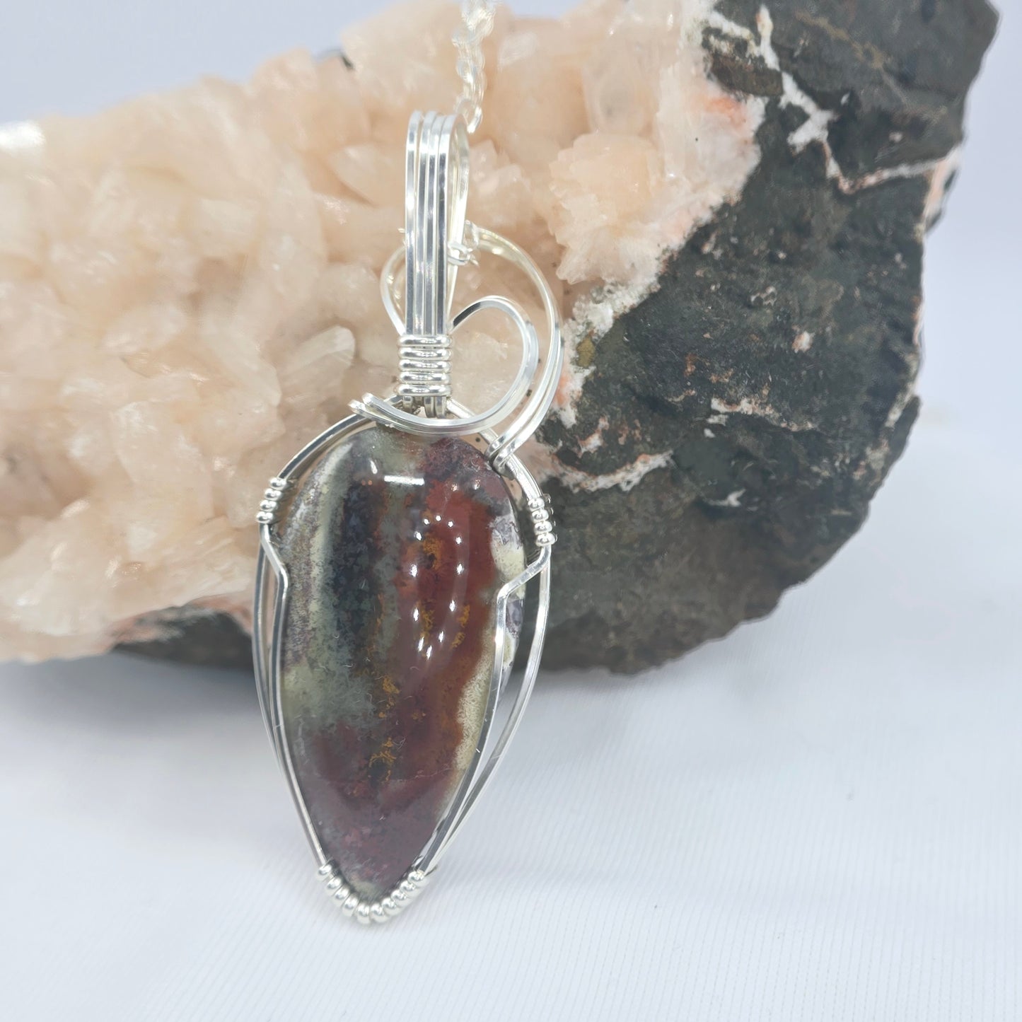 Dragon's Blood Pendant Wrapped In Sterling Silver