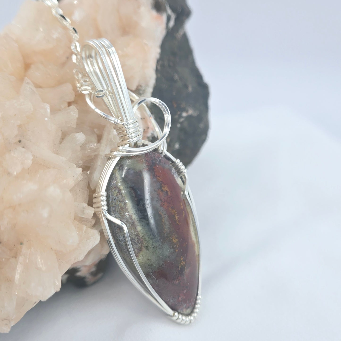 Dragon's Blood Pendant Wrapped In Sterling Silver
