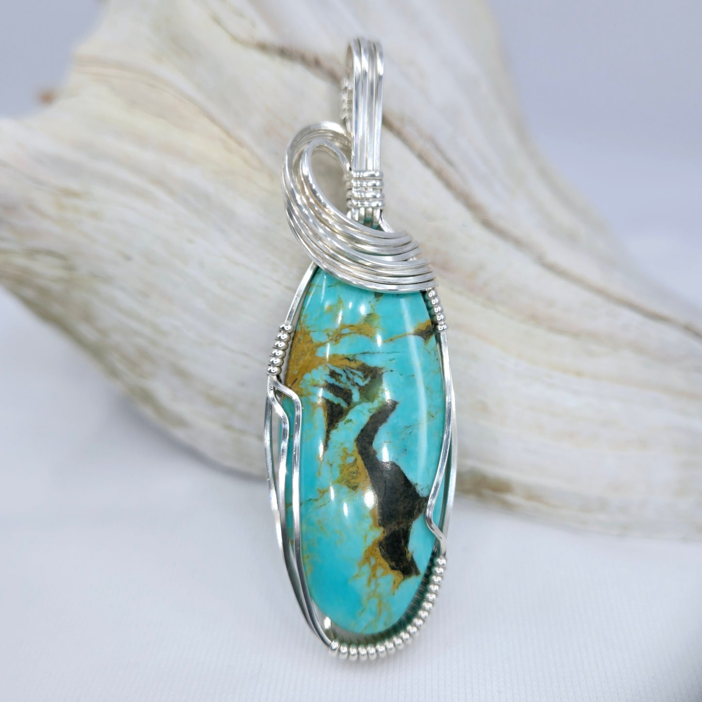 Tyrone Turquoise Pendant Wrapped In Sterling Silver