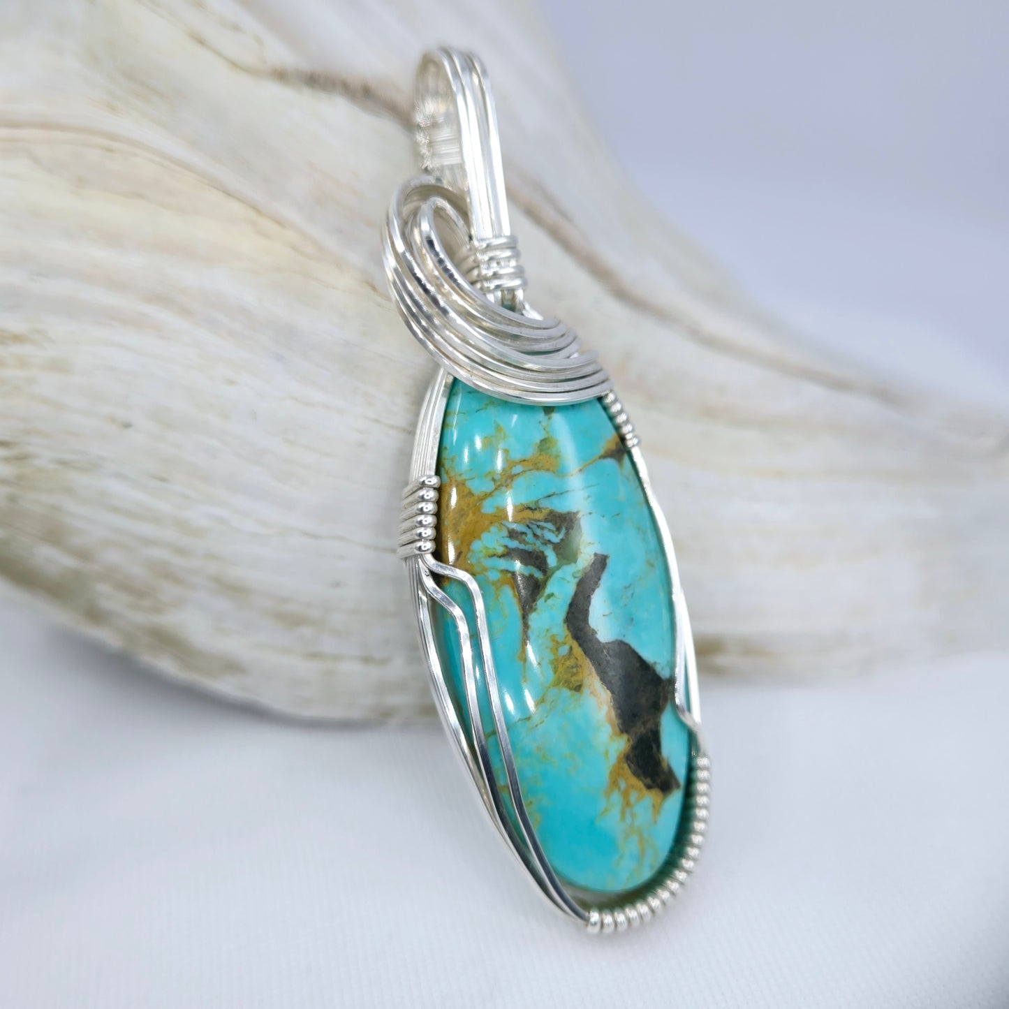 Tyrone Turquoise Pendant Wrapped In Sterling Silver
