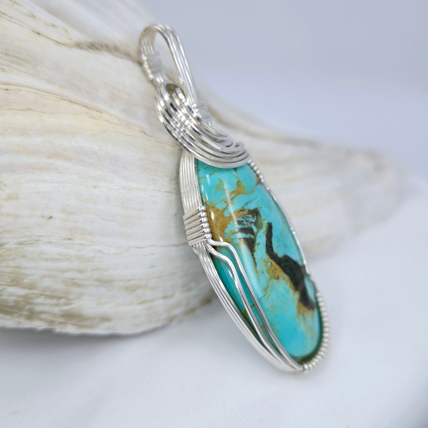 Tyrone Turquoise Pendant Wrapped In Sterling Silver