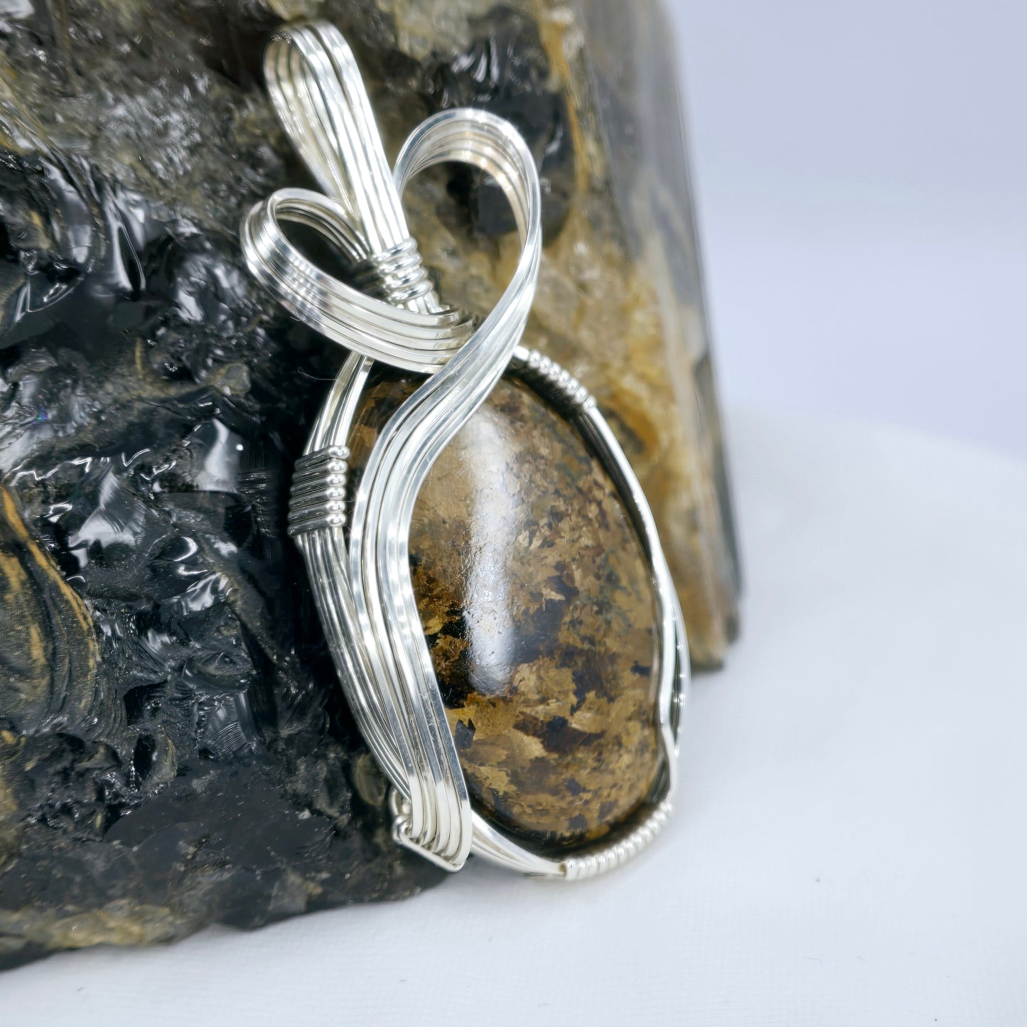 Bronzite Pendant Wrapped In Sterling Silver