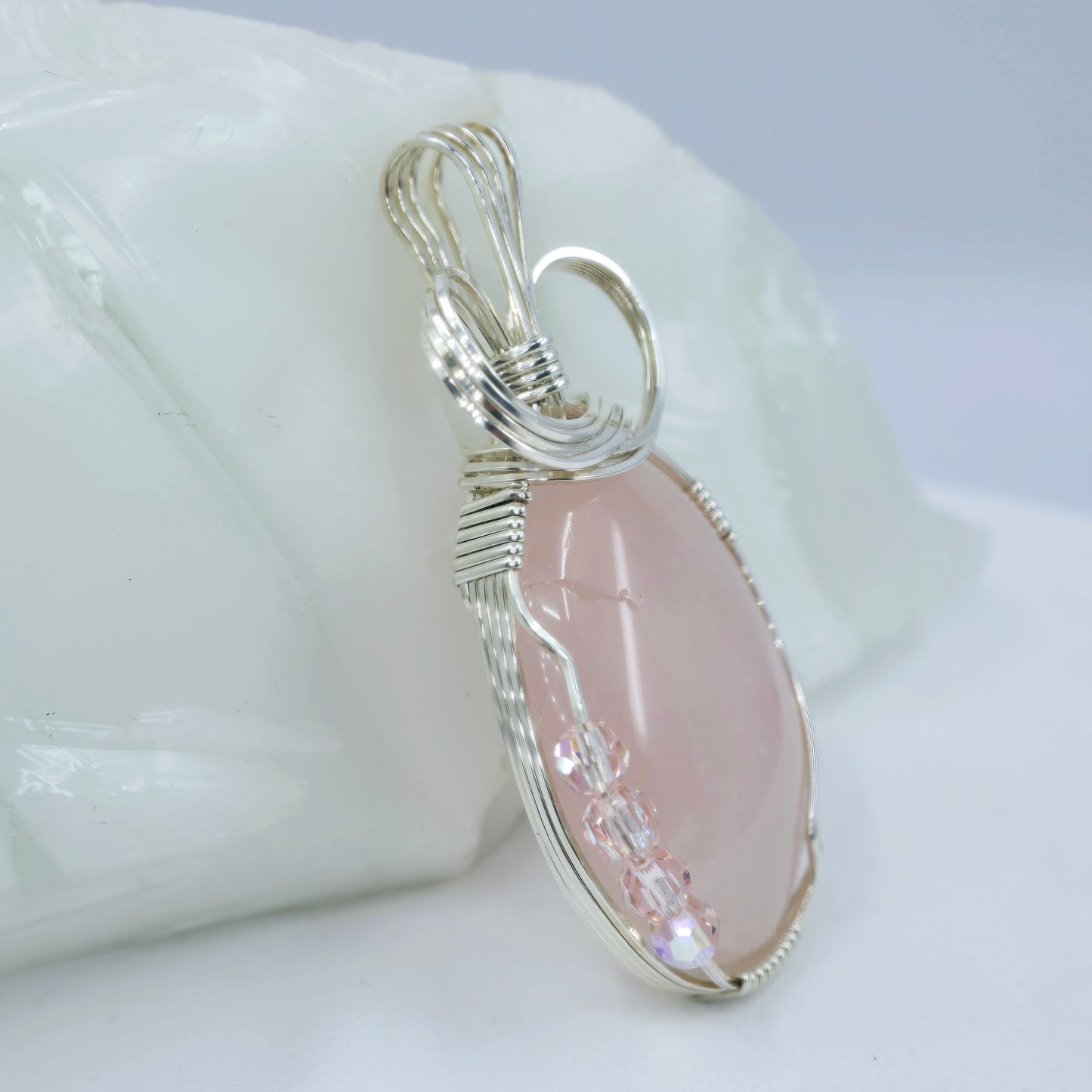 Rose Quartz Pendant Wrapped In Sterling Silver