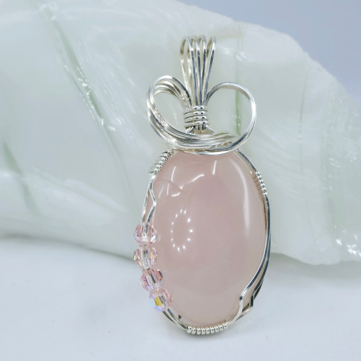 Rose Quartz Pendant Wrapped In Sterling Silver