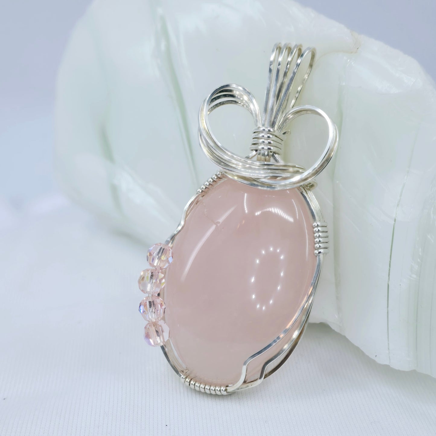 Rose Quartz Pendant Wrapped In Sterling Silver