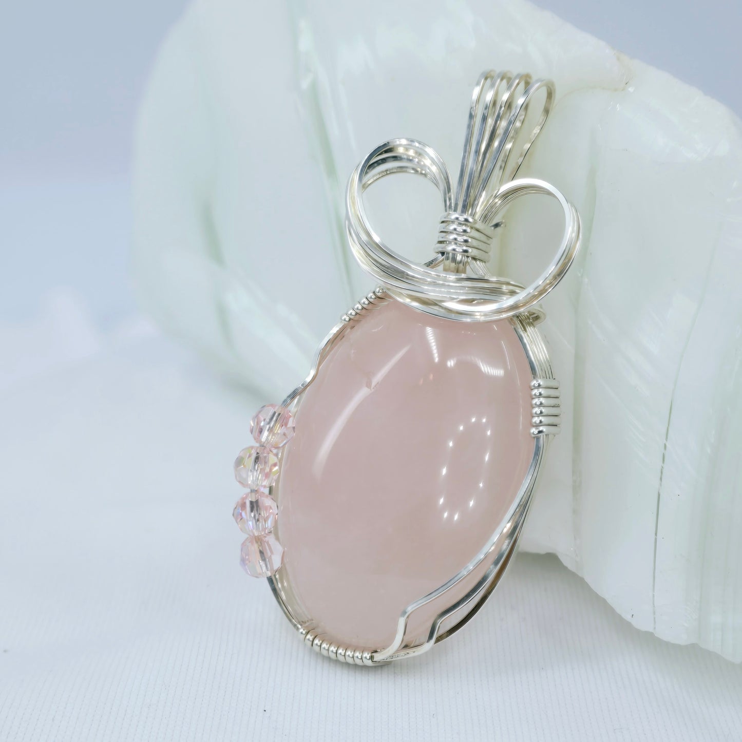 Rose Quartz Pendant Wrapped In Sterling Silver