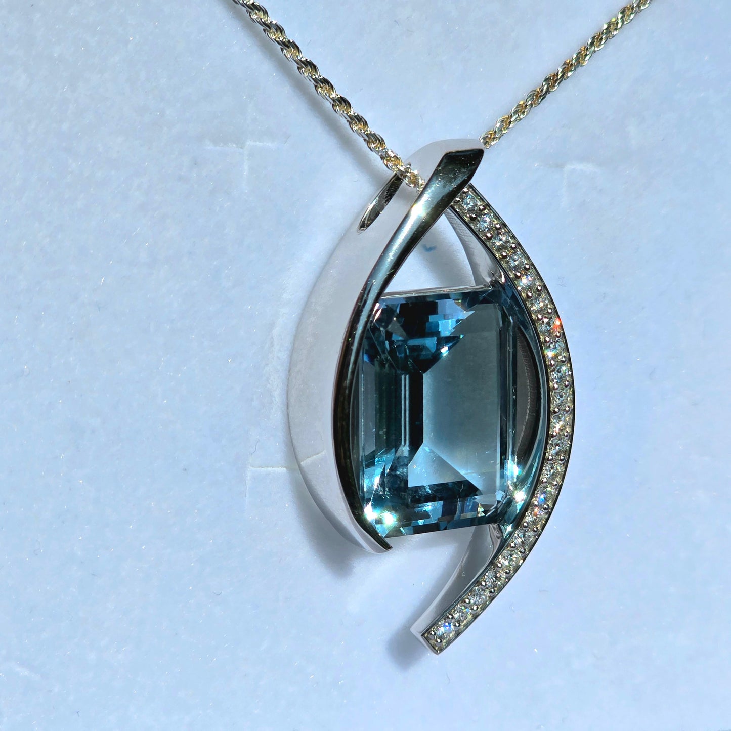 22.25 Carat Blue Topaz Set In Solid Platinum with 21 Accent Diamonds