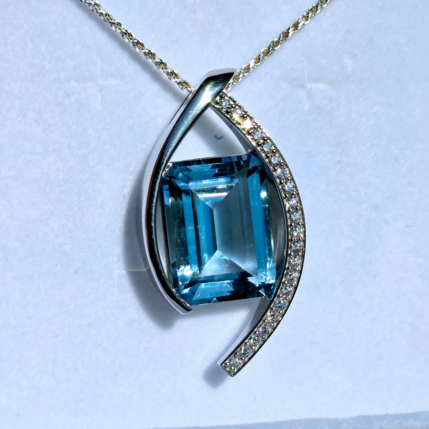 22.25 Carat Blue Topaz Set In Solid Platinum with 21 Accent Diamonds