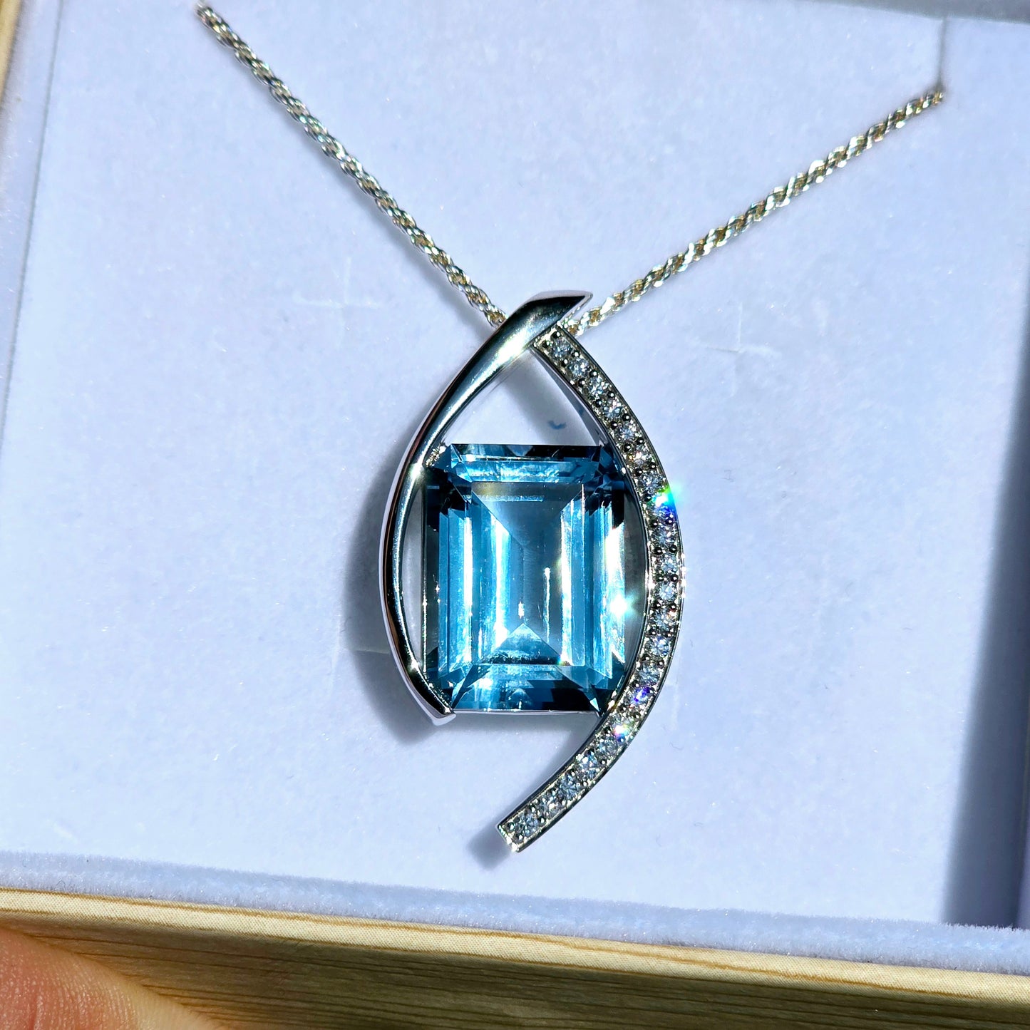 22.25 Carat Blue Topaz Set In Solid Platinum with 21 Accent Diamonds
