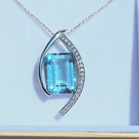 22.25 Carat Blue Topaz Set In Solid Platinum with 21 Accent Diamonds